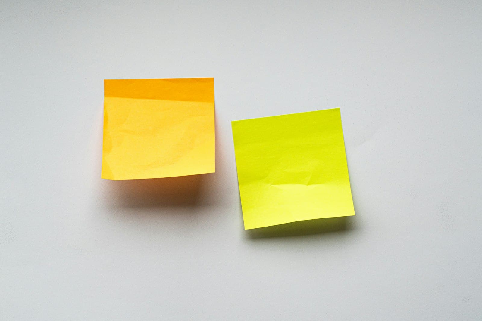 Sticky notes arranged to show how research ideas connect and become reusable.