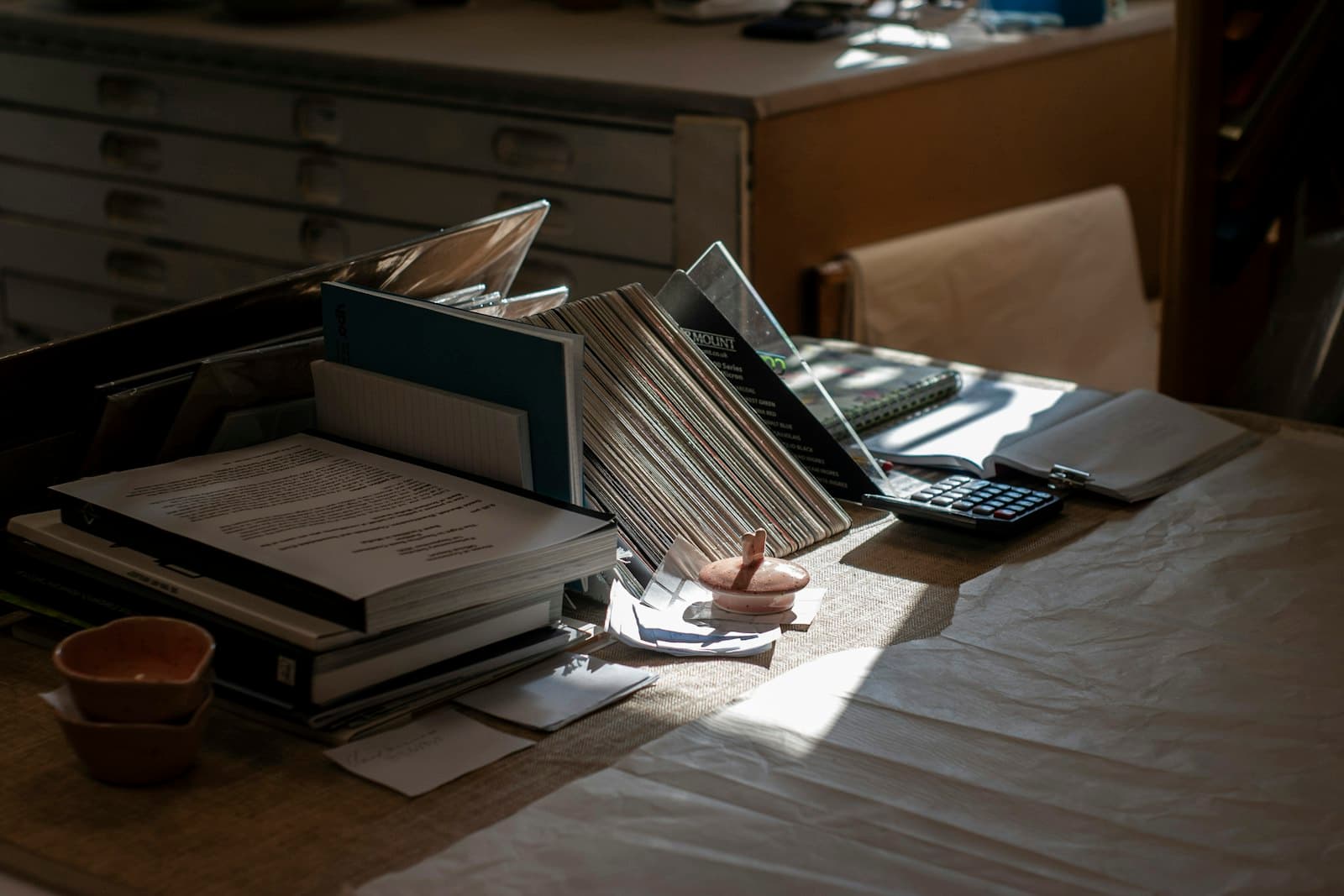 A focused writing desk representing careful master thesis revision.