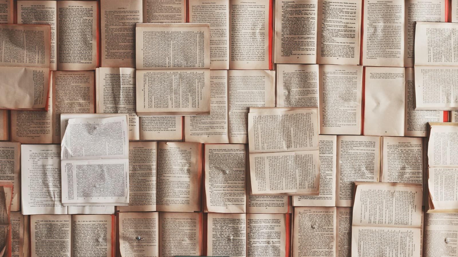 Landscape photograph of reference books, citation notes, and a highlighted article arranged for an annotated bibliography.
